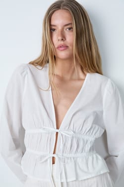 Katoenen top met lange mouwen en strikjes;${refinementColor}