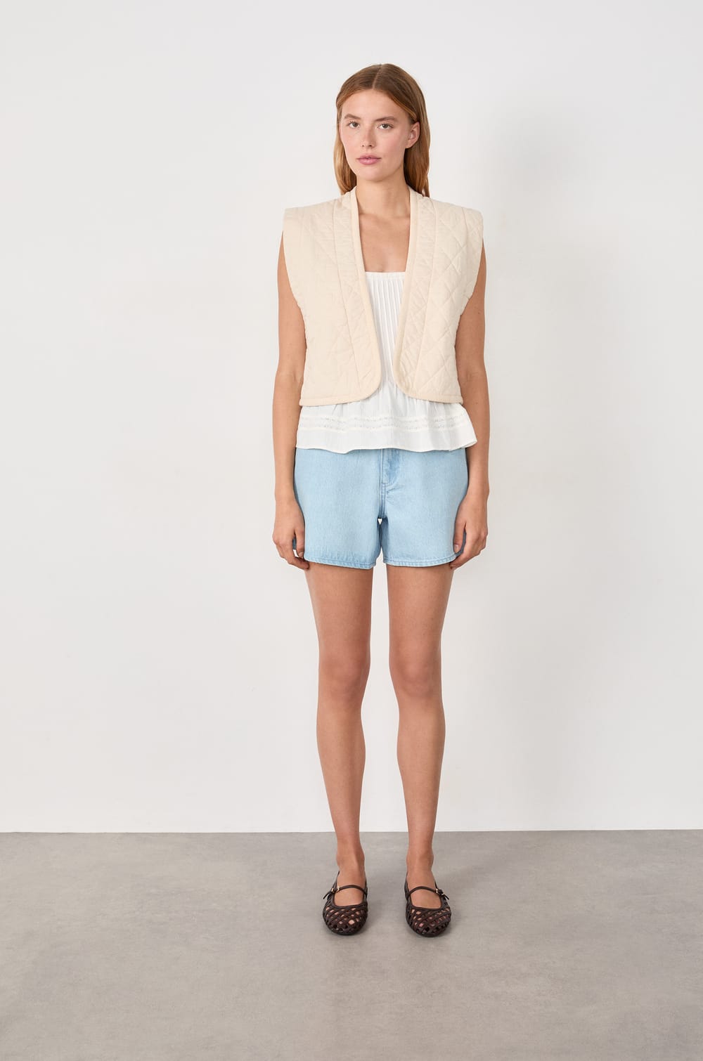 Mouwloos gewatteerd katoenen vest;${refinementColor}