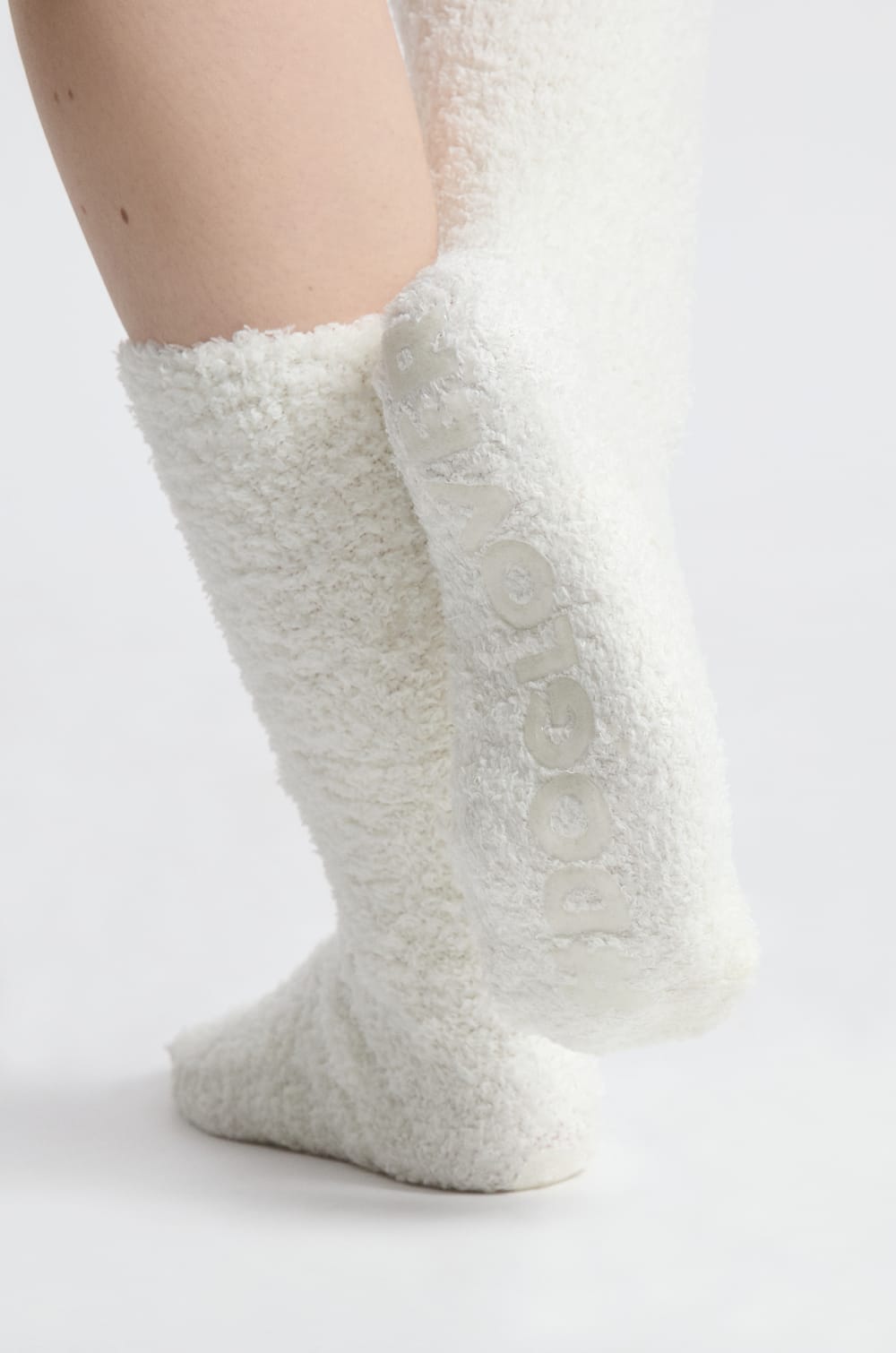 Socken aus Kunstfell;${refinementColor}