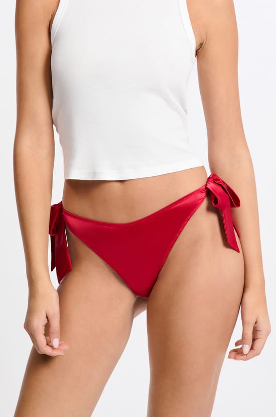 Tanga en broderie avec noeuds;${refinementColor}