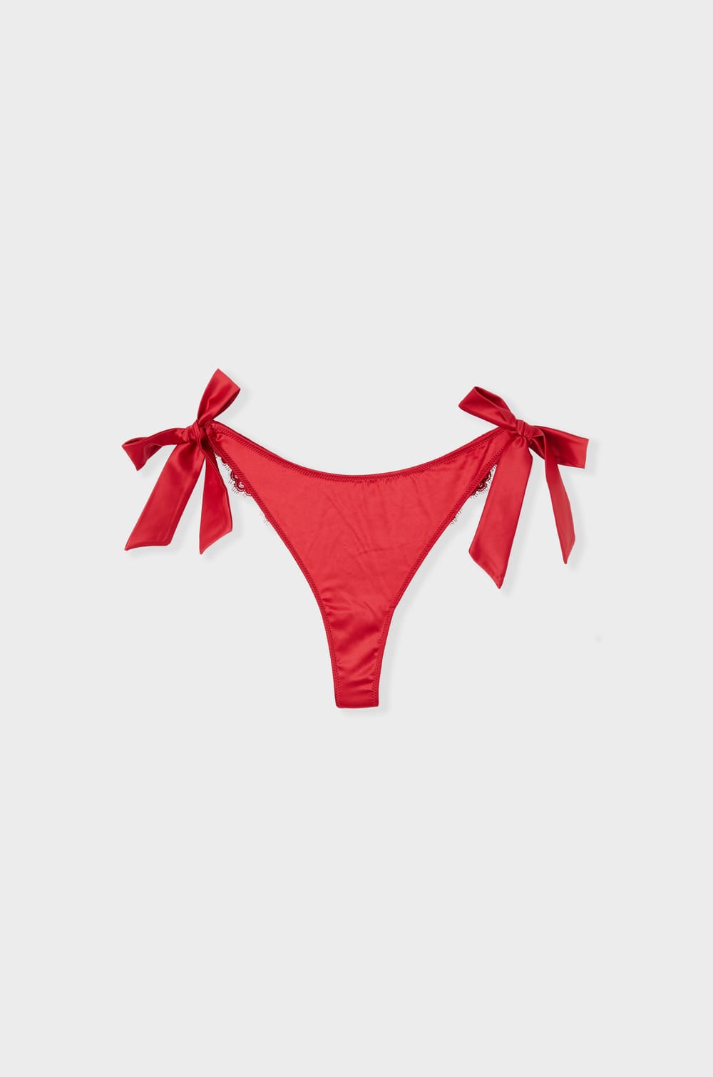 Tanga en broderie avec noeuds;${refinementColor}