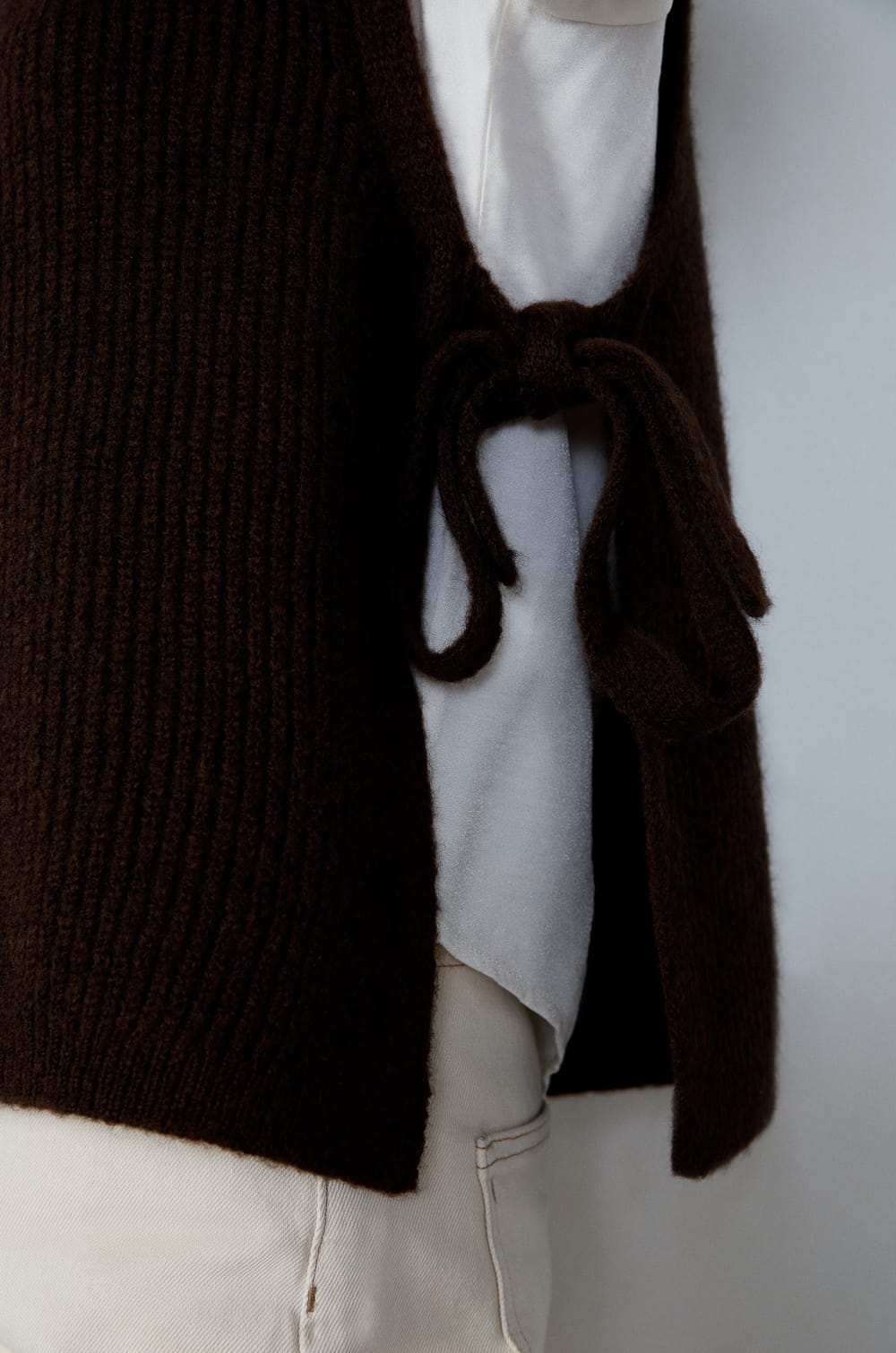 Sleeveless High Neck Tie-Front Sweater;${refinementColor}