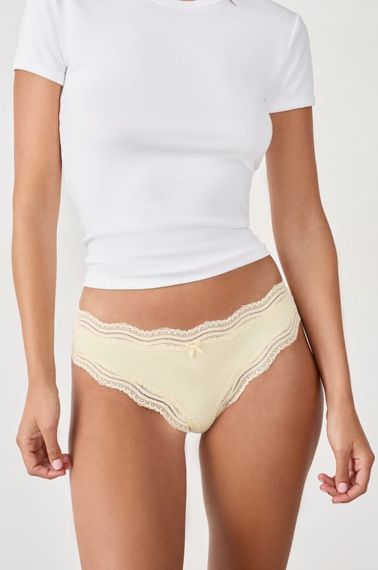 Microfibre tanga with lace trim;${refinementColor}